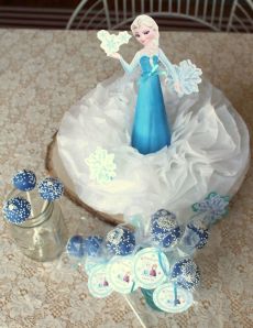 Frozen centerpiece, Elsa paper doll in a tissue paper flower.